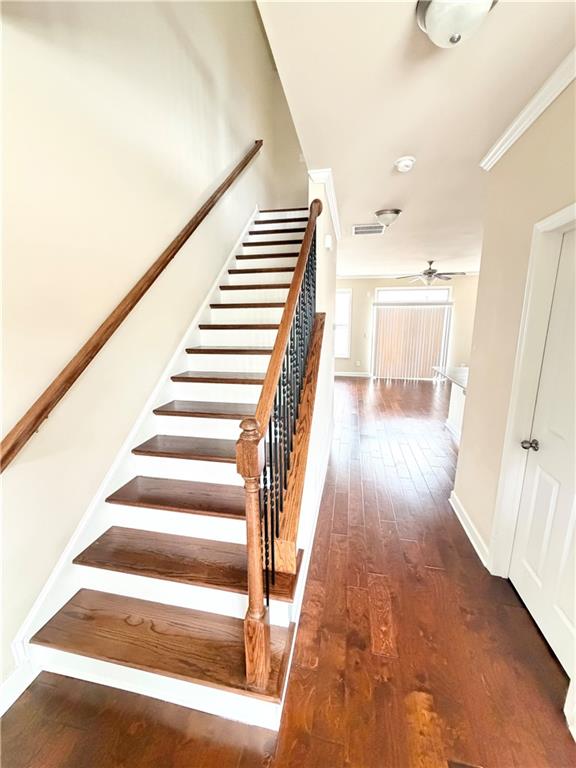 4954 Rosalie Road Alpharetta, GA 30022 - Photo 3 of 21 a view of entryway and hall with wooden floor