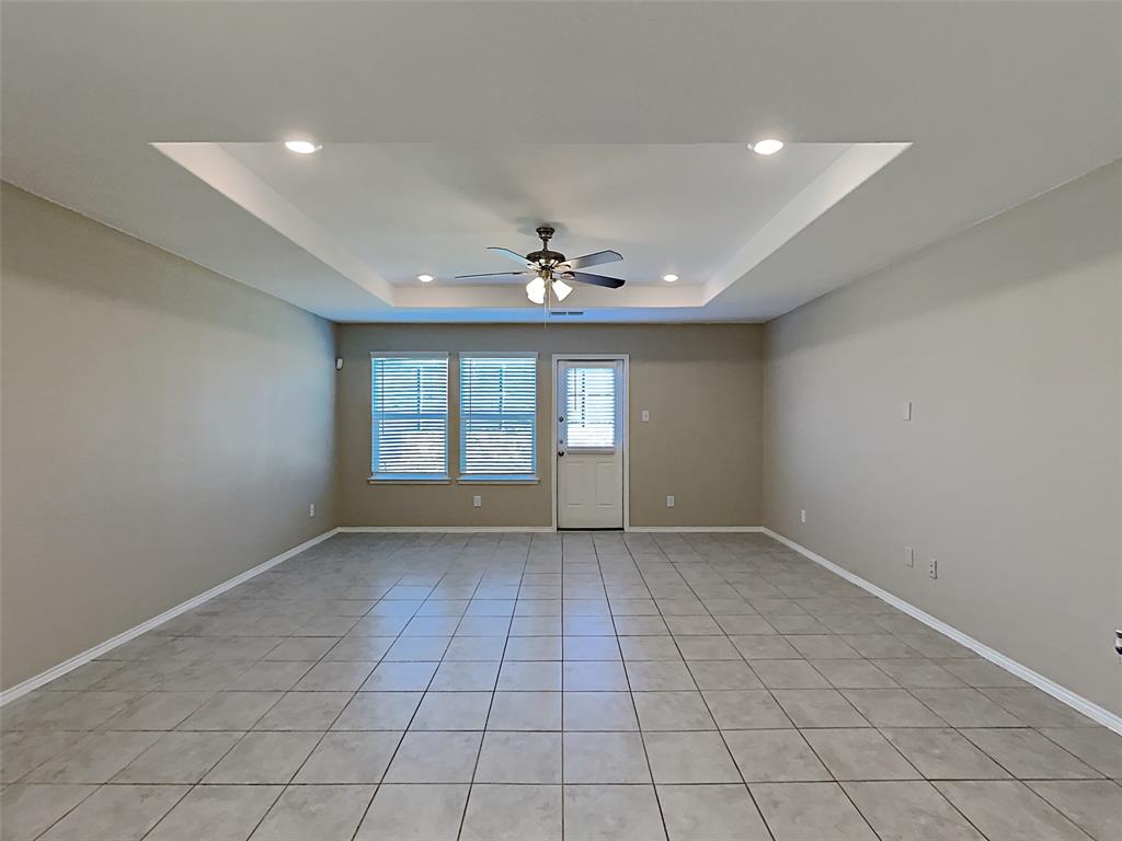 2220 Heaton Street Forney, TX 75126 - Photo 5 of 11 a view of an empty room with a window