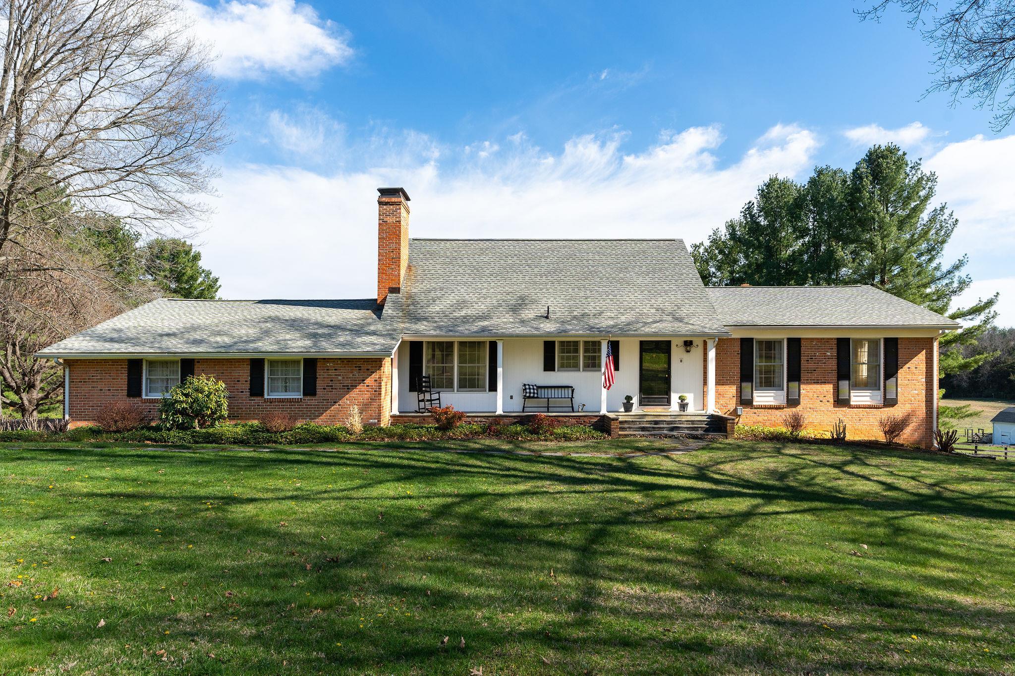 813 Cattle Scales Road Waynesboro, VA 22980 - Photo 1 of 75 a front view of a house with a garden