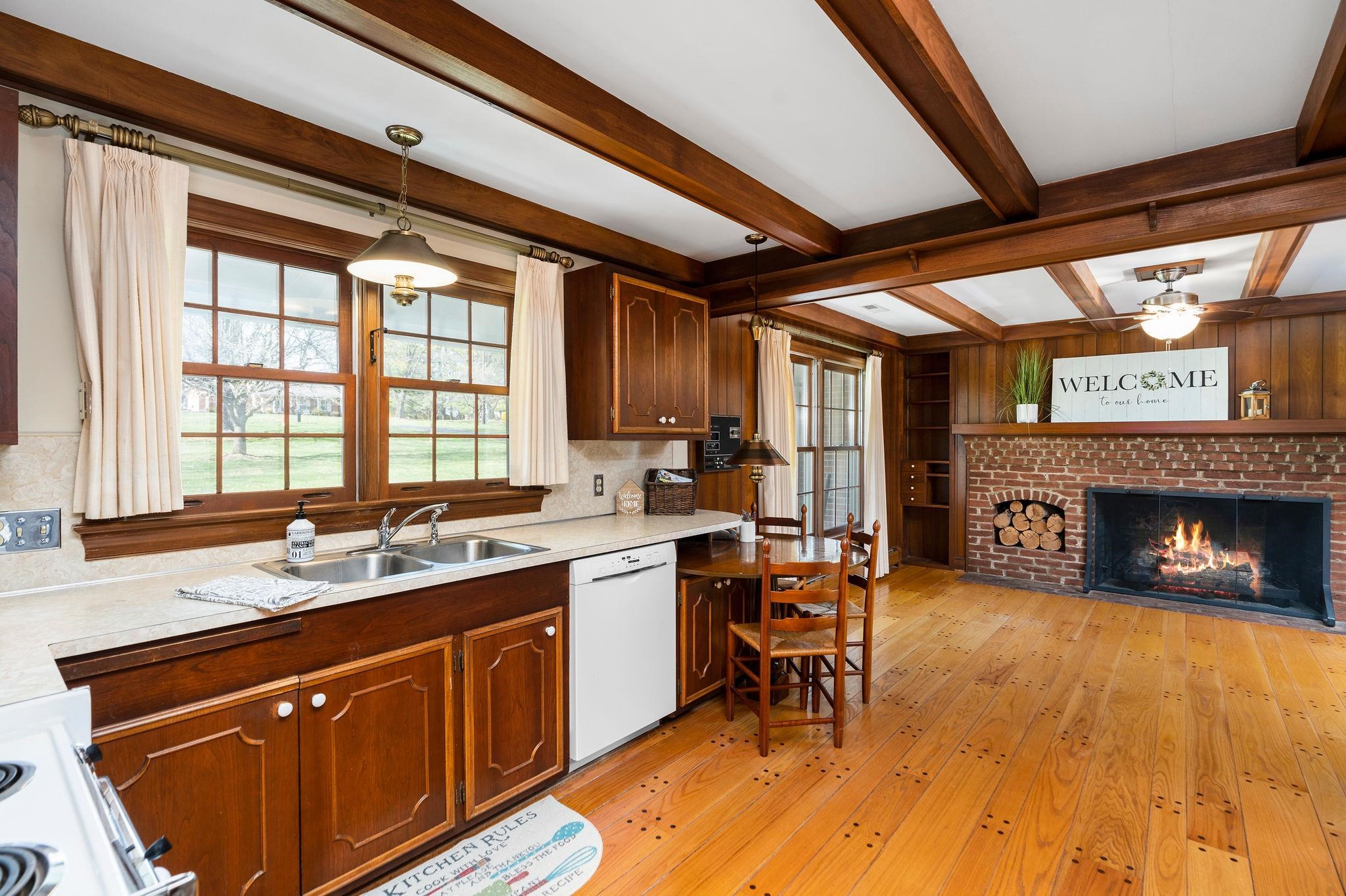 813 Cattle Scales Road Waynesboro, VA 22980 - Photo 16 of 75 a kitchen with stainless steel appliances granite countertop sink stove and cabinets