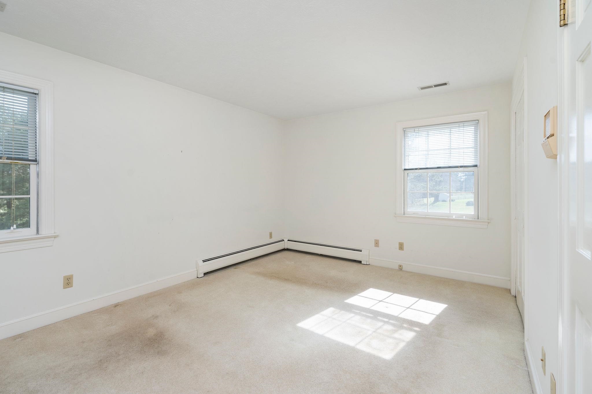 813 Cattle Scales Road Waynesboro, VA 22980 - Photo 35 of 75 an empty room with a window