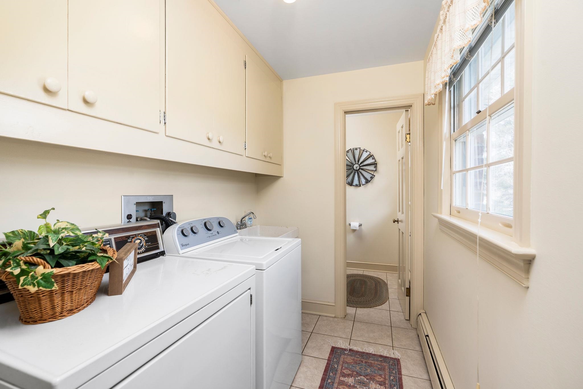 813 Cattle Scales Road Waynesboro, VA 22980 - Photo 39 of 75 a view of a storage and utility room with washer and dryer