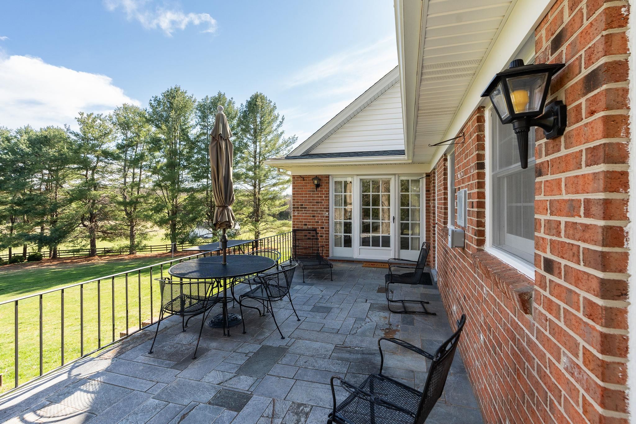 813 Cattle Scales Road Waynesboro, VA 22980 - Photo 56 of 75 a view of a house with backyard and sitting area