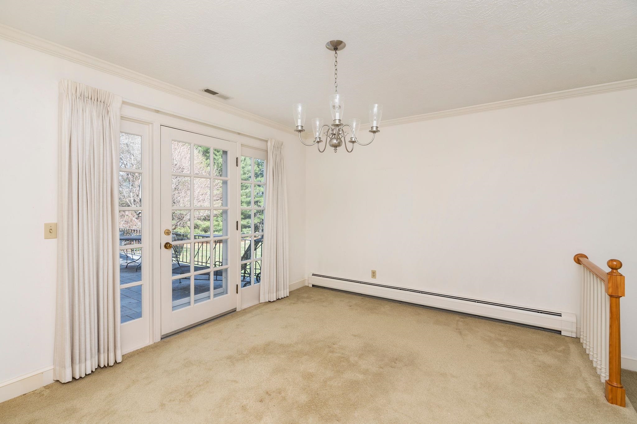 813 Cattle Scales Road Waynesboro, VA 22980 - Photo 10 of 75 an empty room with windows and entrance
