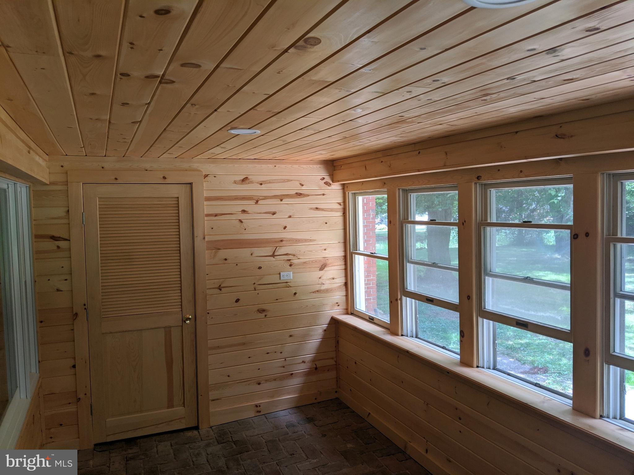 5299 Skinners Neck Road Rock Hall, MD 21661 - Photo 17 of 38 Newly paneled Knotty Pine Sun room