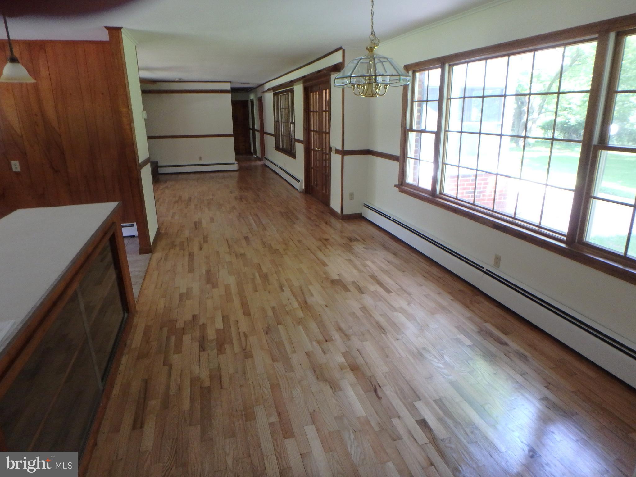 5299 Skinners Neck Road Rock Hall, MD 21661 - Photo 21 of 38 Interior newly refinished hardwood.