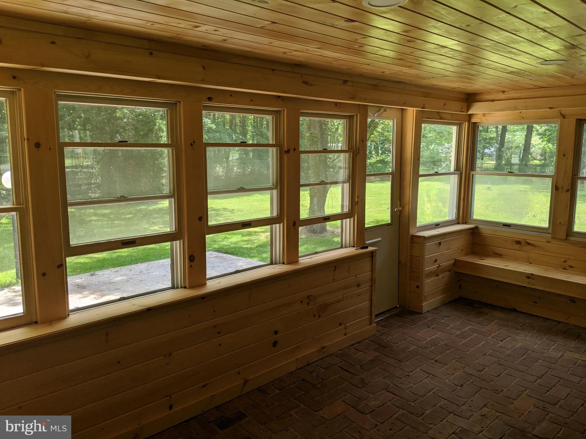 5299 Skinners Neck Road Rock Hall, MD 21661 - Photo 23 of 38 Newly paneled Knotty Pine Sun room