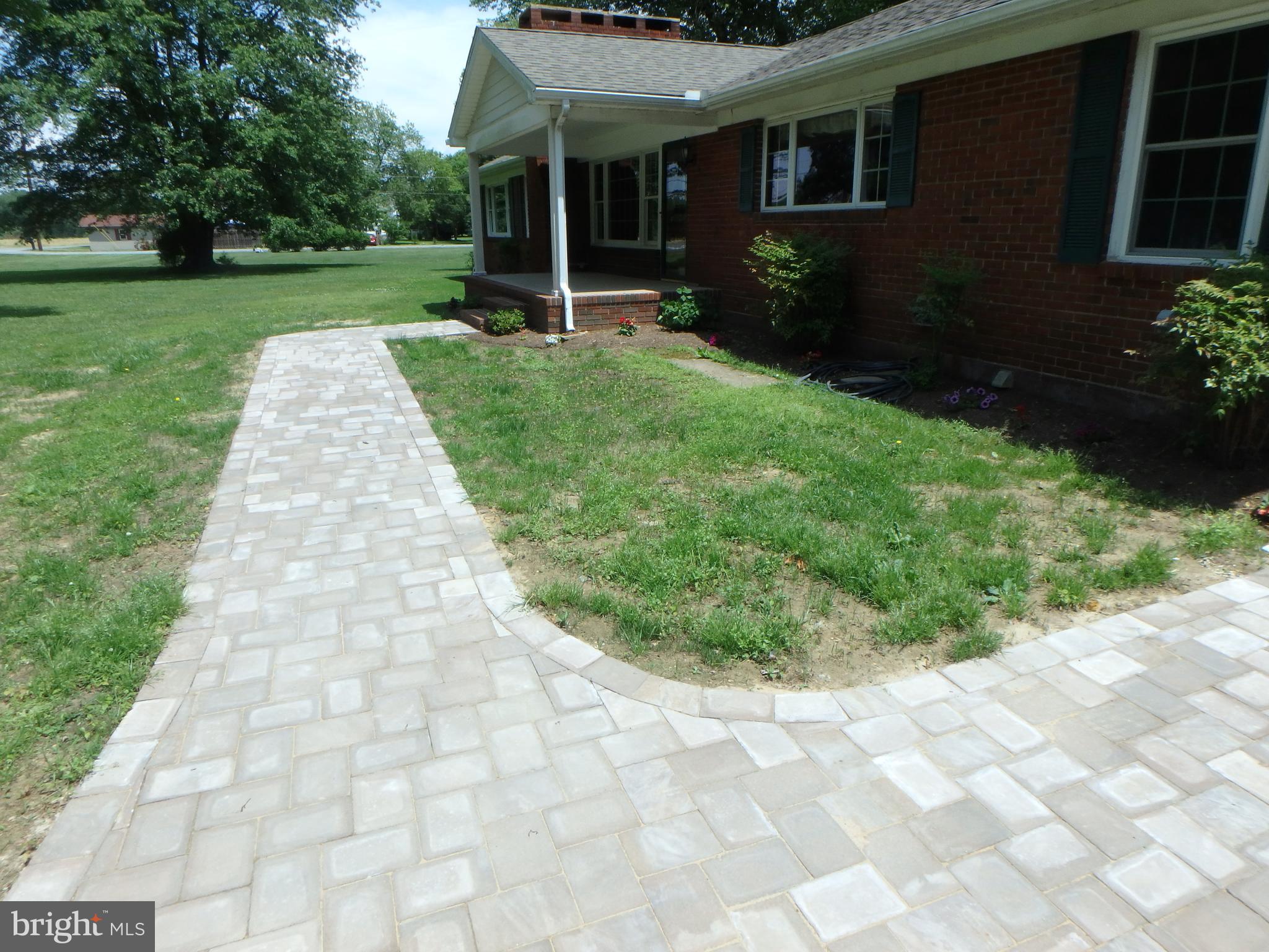 5299 Skinners Neck Road Rock Hall, MD 21661 - Photo 6 of 38 New Paver Walk way and planted beds.
