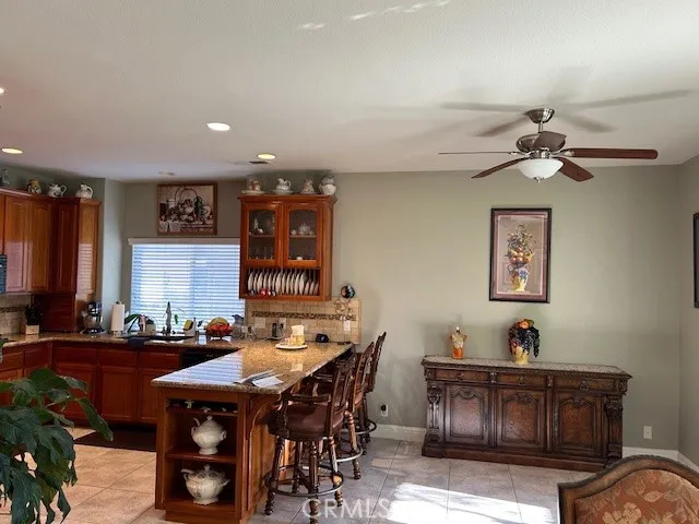a view of a livingroom with furniture and window