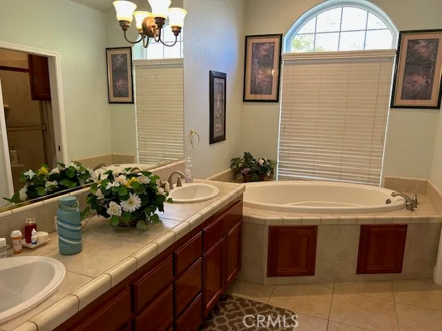 a bathroom with a toilet and a shower curtain