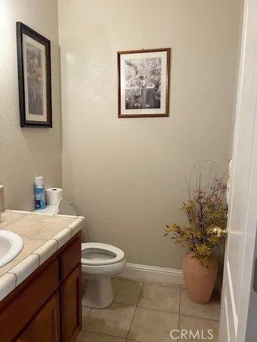 a bathroom with a sink double vanity and a mirror