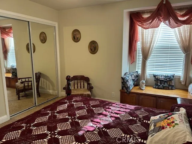 a view of a house with a yard patio and entertaining space