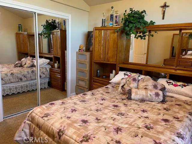 a front view of a house with a yard outdoor seating and garden