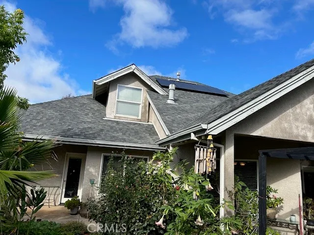 a view of a garden with a bench