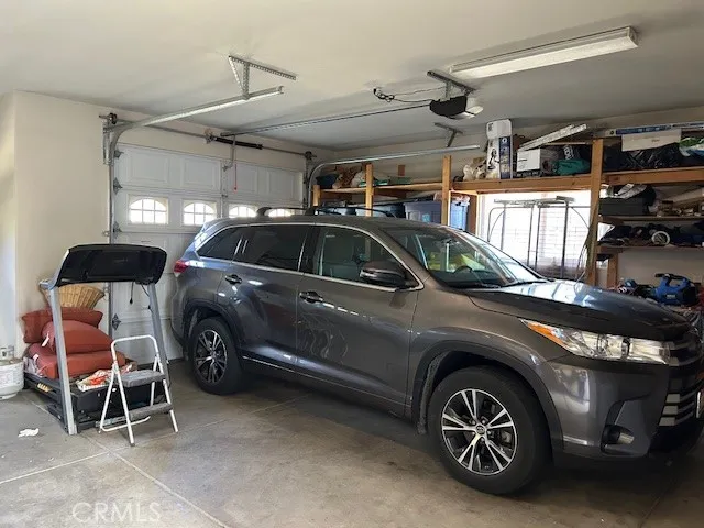 a backyard of a house with lots of green space and plants