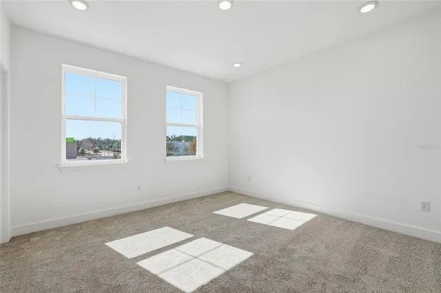 an empty room with windows