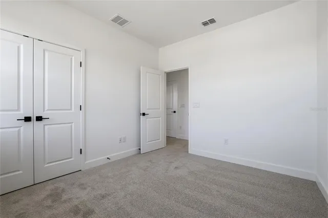 an empty room with a door