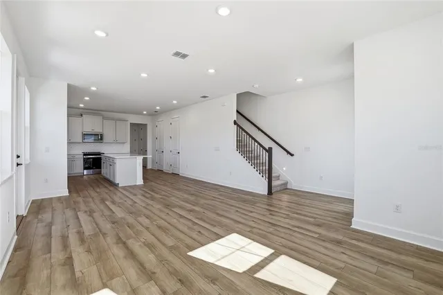 a view of entryway with wooden floor