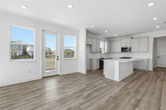 a view of kitchen with wooden floor