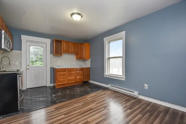 a area with window and fireplace