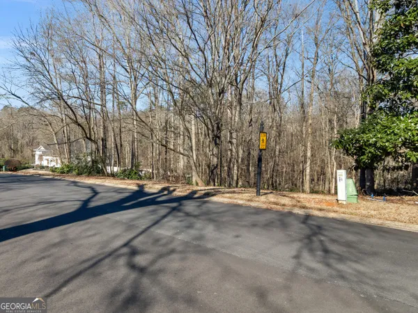 a view of road with trees