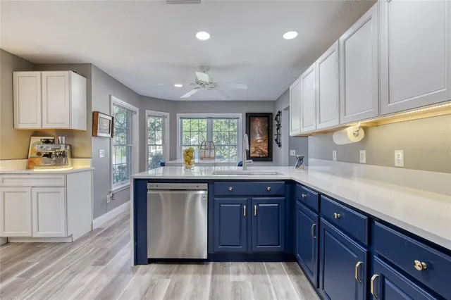a bathroom with a toilet a sink and shower
