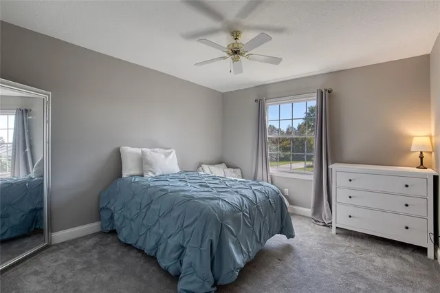 an aerial view of multiple house with yard