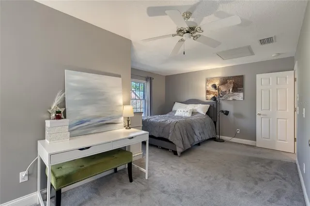 an aerial view of residential houses with outdoor space and street view