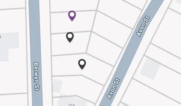 a bathroom with a shower and mirror