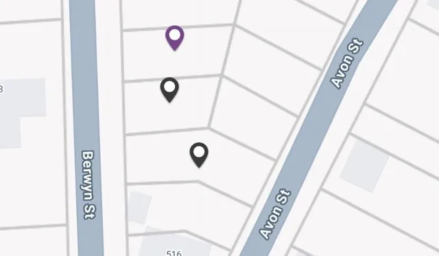 a bathroom with a shower and mirror