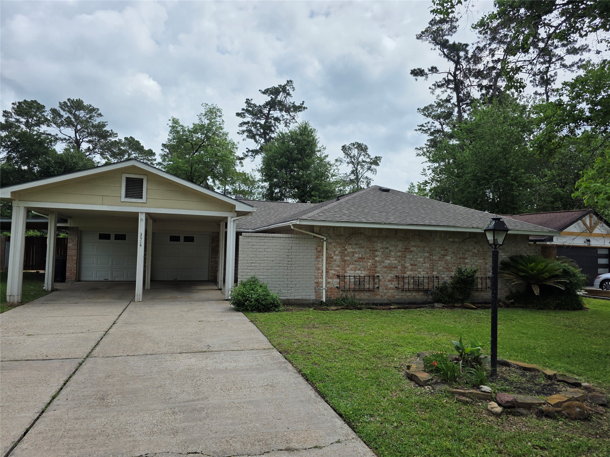 3414 Bristlecone Trail Spring, TX 77380 - Photo 1 of 16 a front view of a house with garden