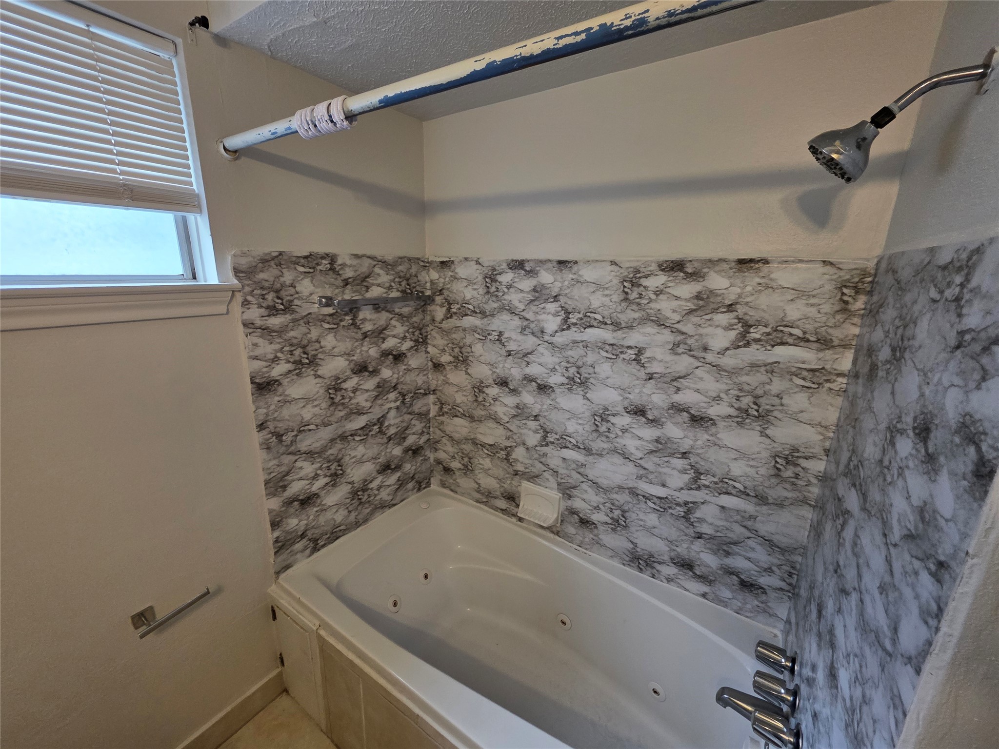 3414 Bristlecone Trail Spring, TX 77380 - Photo 12 of 16 a bathroom with a bathtub and a shower