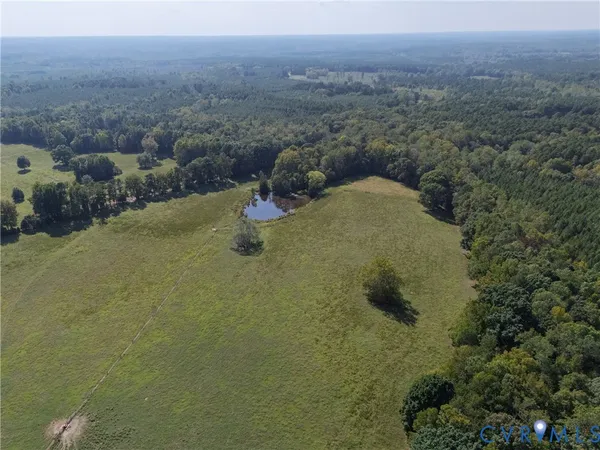 a view of a lake with a yard