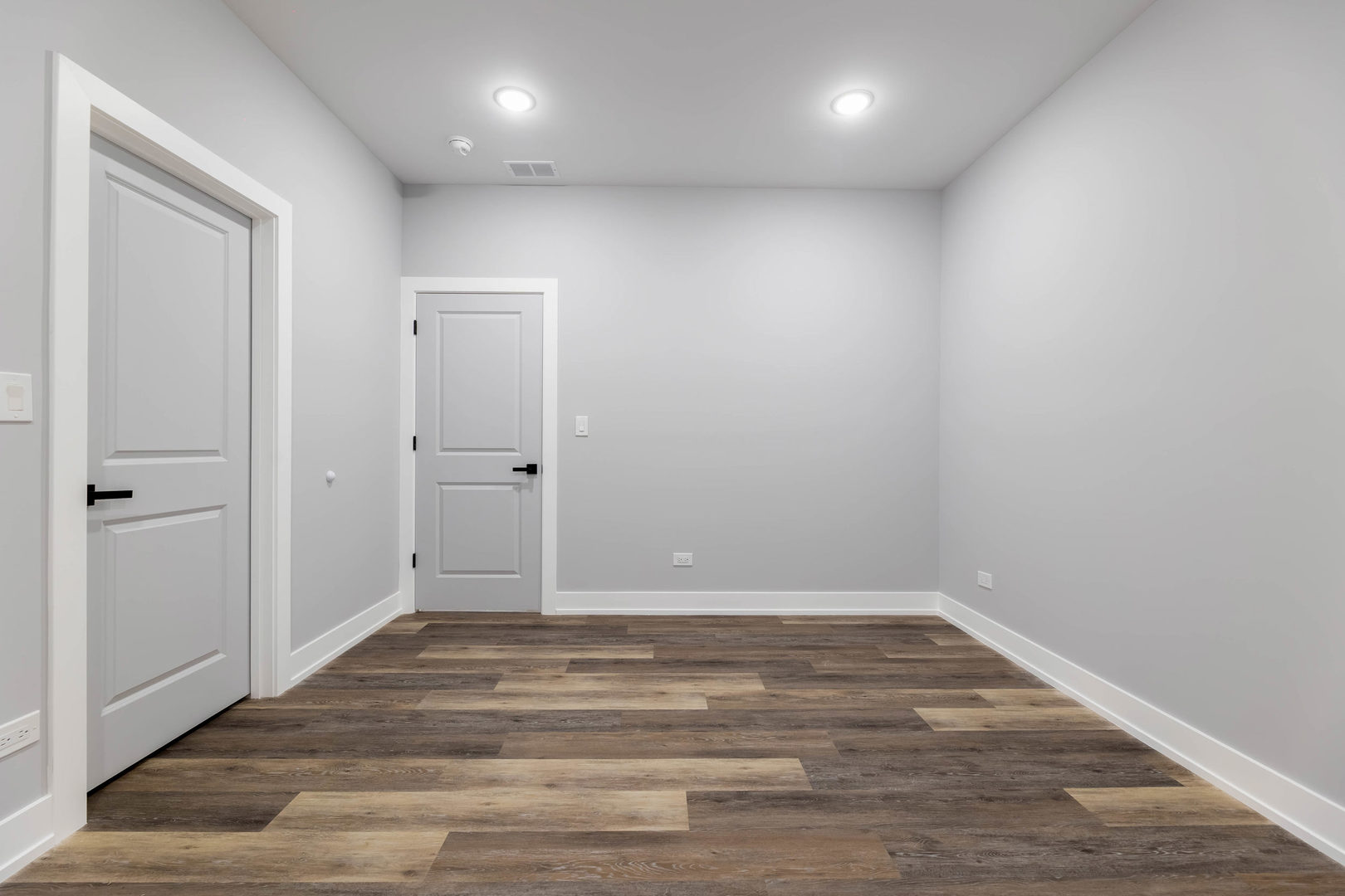 5809 South Indiana Avenue, Unit 2 Chicago, IL 60637 - Photo 16 of 18 wooden floor in an empty room