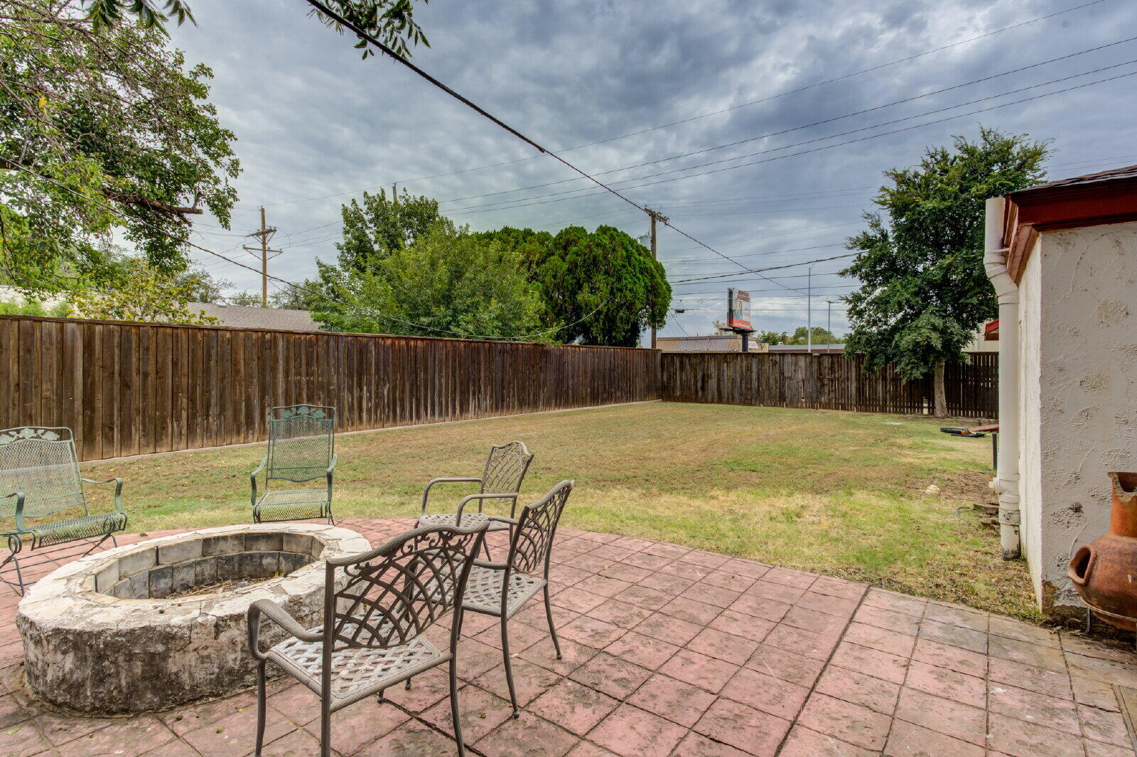 2305 18th Street, Unit FRONT Lubbock, TX 79401 - Photo 70 of 73 a view of backyard with seating space and trees