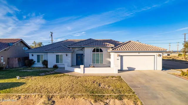 a view of a swimming pool with a chairs