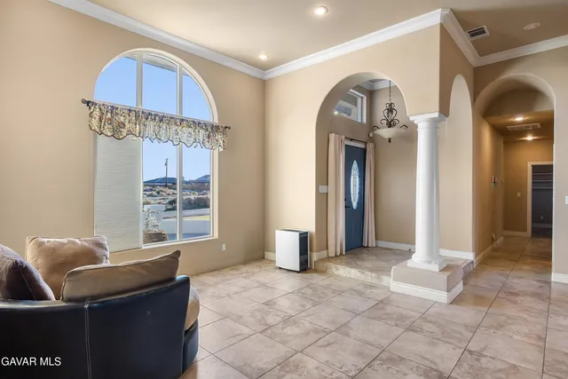 a view of a livingroom with furniture and windows