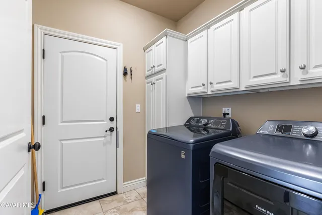 a view of a kitchen with appliances