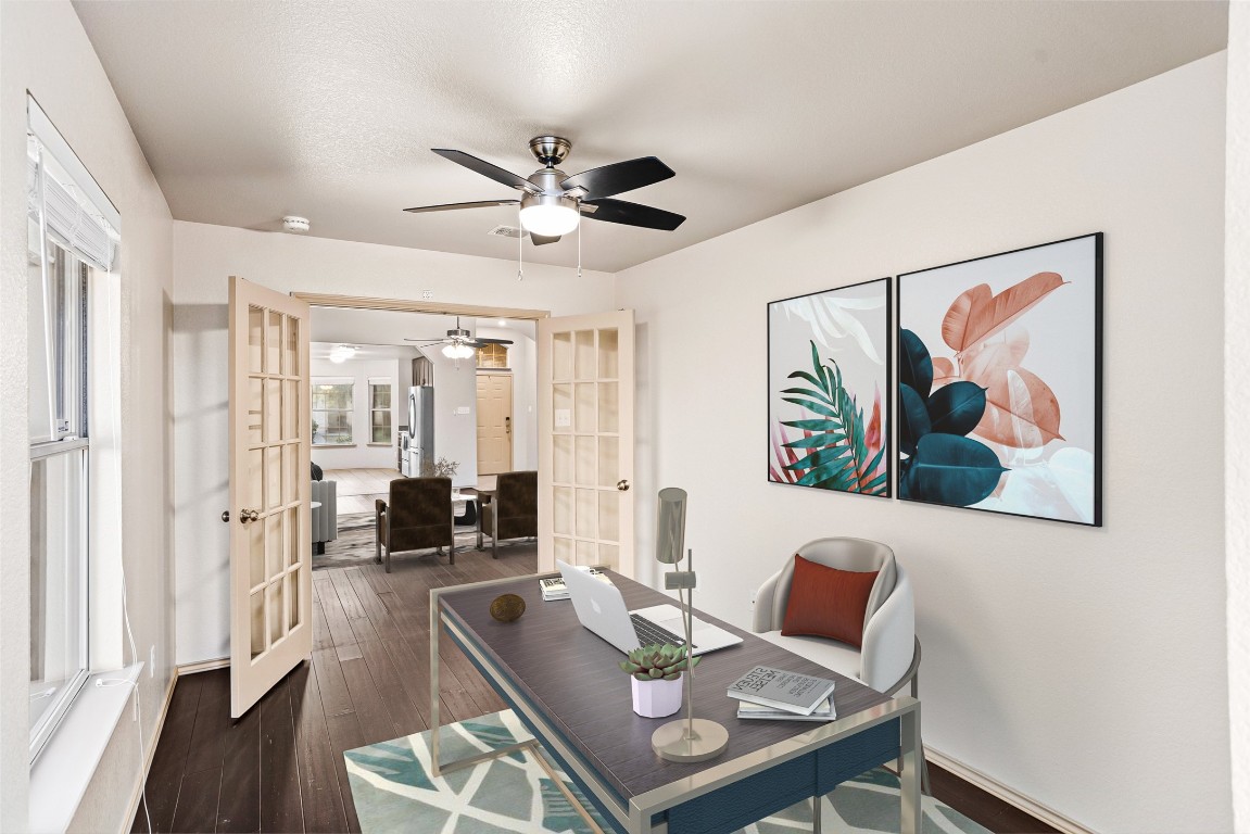 409 Lydia Lane Thrall, TX 76578 - Photo 13 of 39 a living room with furniture and wooden floor