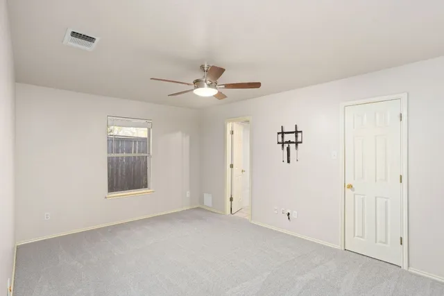 a balcony with table and chairs