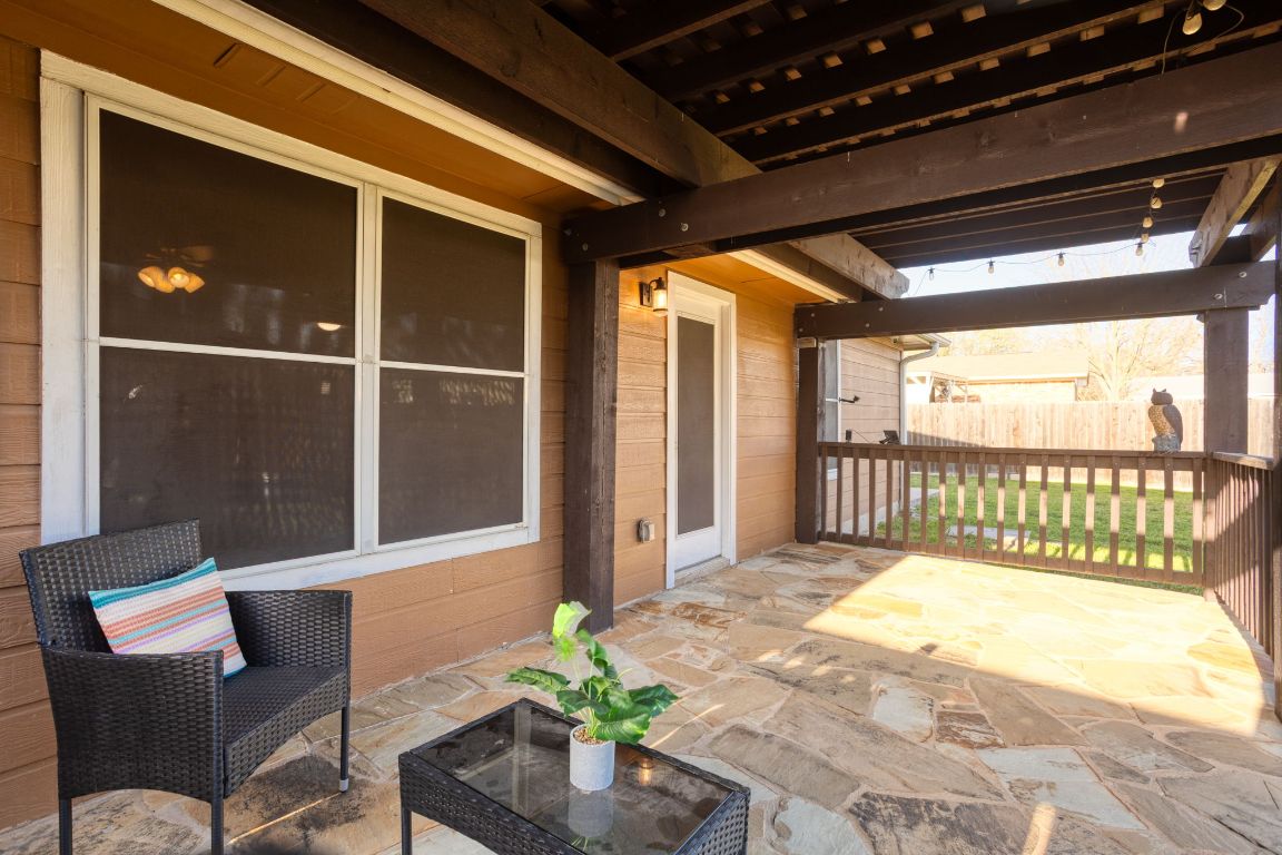 409 Lydia Lane Thrall, TX 76578 - Photo 33 of 39 a balcony with table and chairs