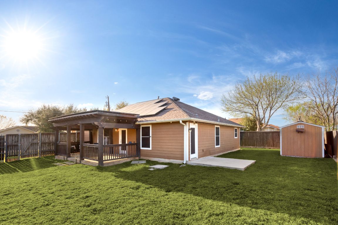 409 Lydia Lane Thrall, TX 76578 - Photo 36 of 39 a front view of a house with a garden