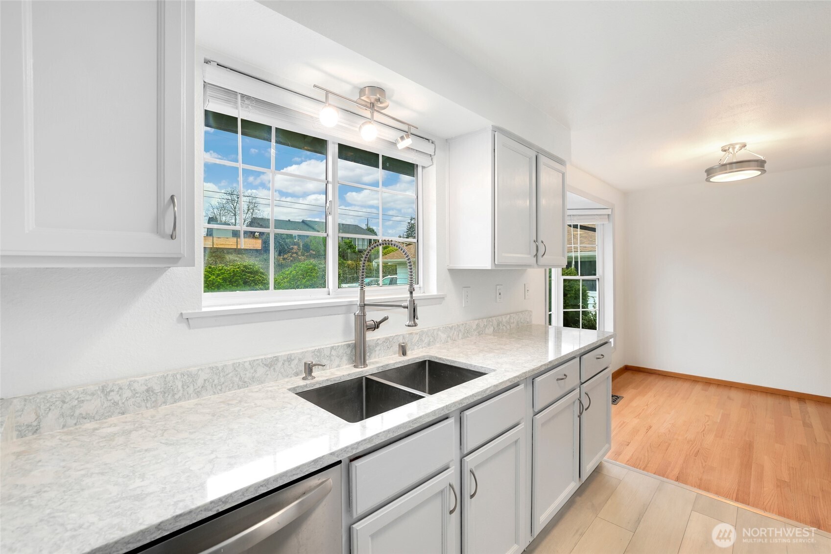 4609 North Vassault Street Tacoma, WA 98407 - Photo 16 of 37 a kitchen with a sink and window