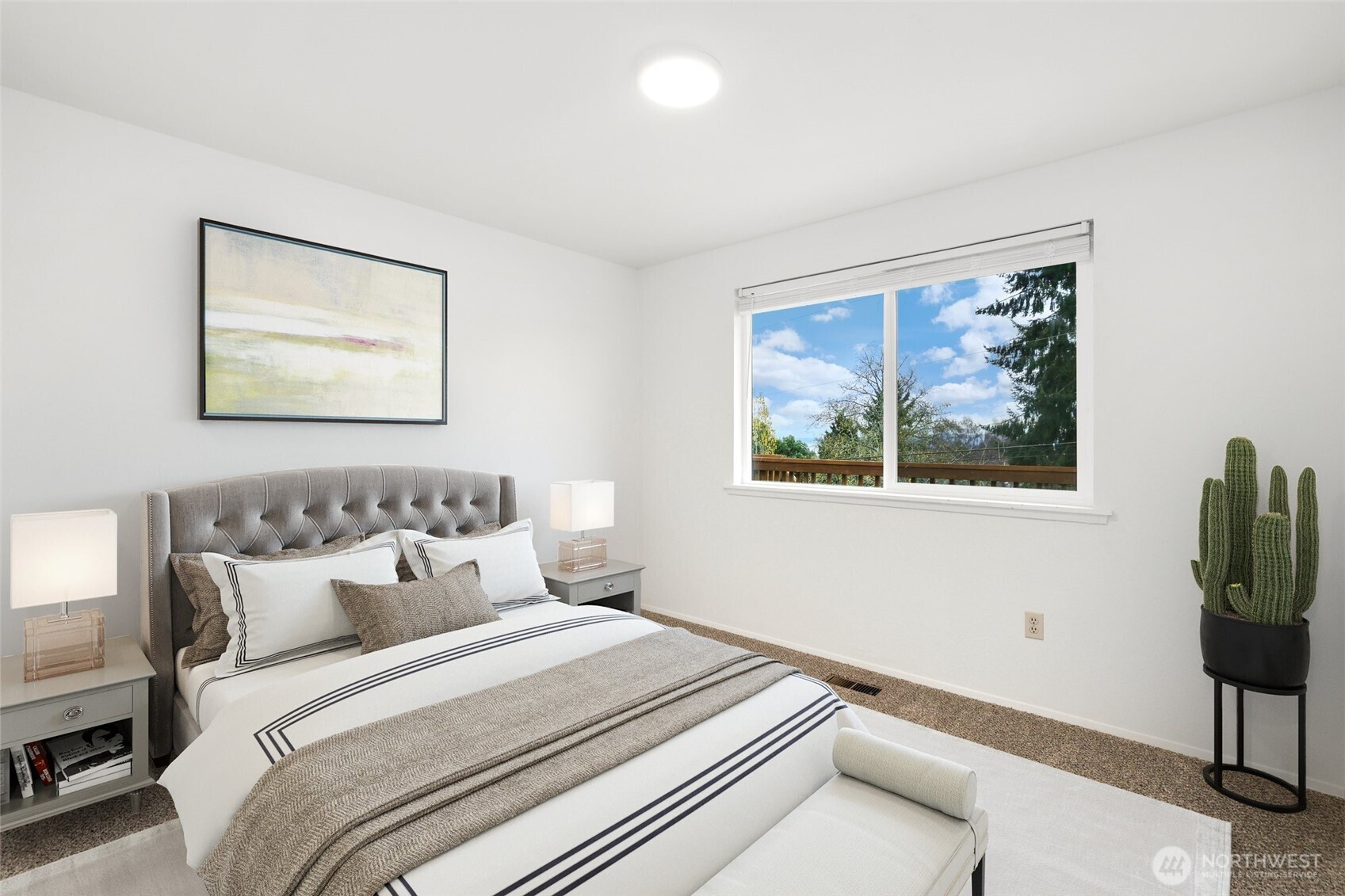 4609 North Vassault Street Tacoma, WA 98407 - Photo 17 of 37 a bedroom with a bed and a painting on the wall