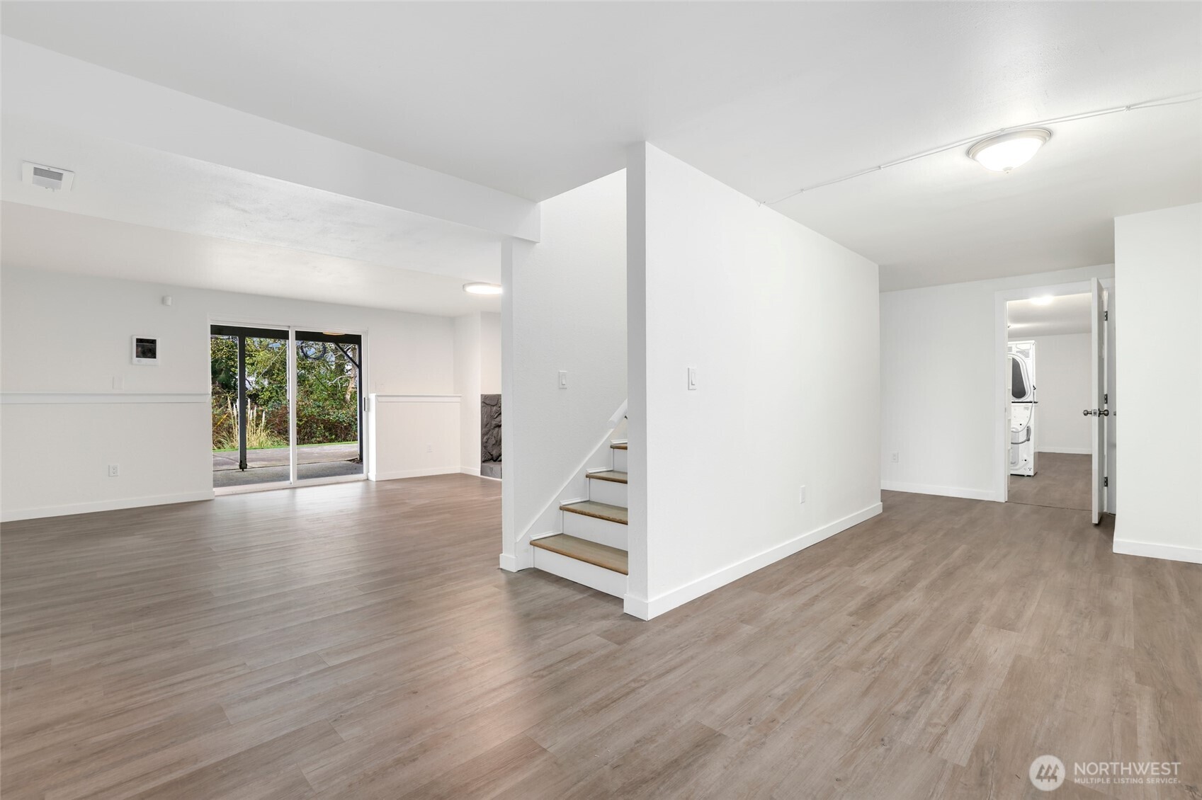 4609 North Vassault Street Tacoma, WA 98407 - Photo 22 of 37 wooden floor in an empty room with a window