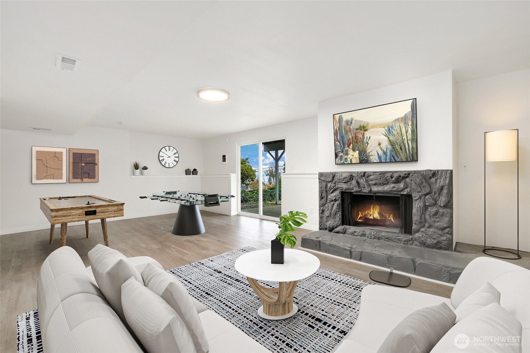 4609 North Vassault Street Tacoma, WA 98407 - Photo 23 of 37 a living room with furniture and a fireplace