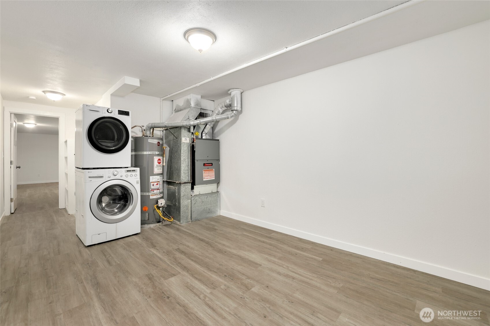 4609 North Vassault Street Tacoma, WA 98407 - Photo 27 of 37 a view of a storage & utility room with washer and dryer
