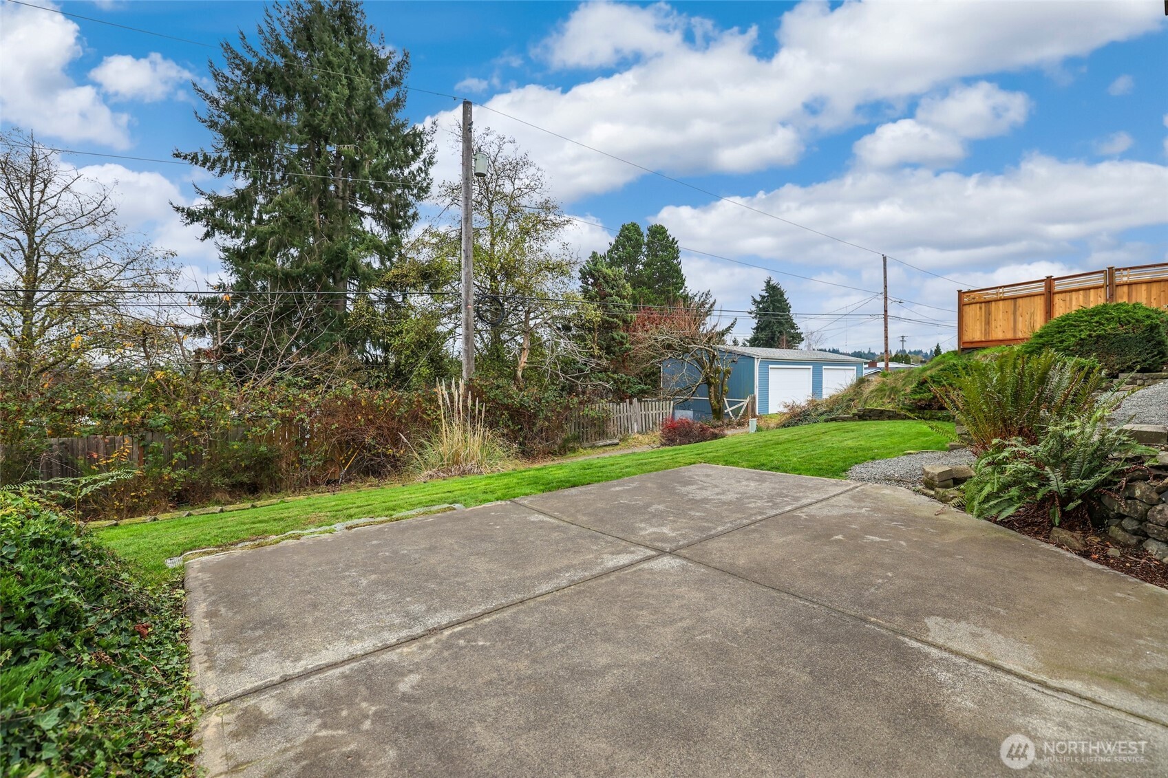4609 North Vassault Street Tacoma, WA 98407 - Photo 31 of 37 a view of a street with a houses in the background
