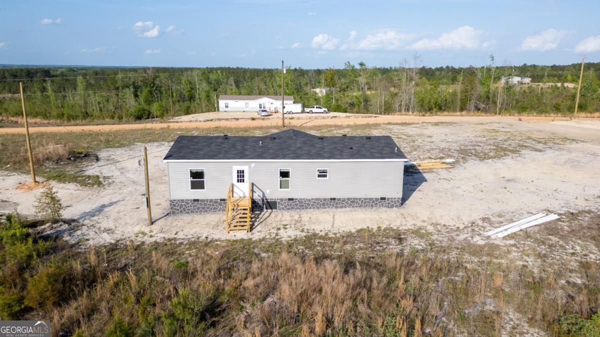 67 Long Leaf Road Hazlehurst, GA 31539 - Photo 16 of 17 a view of a backyard