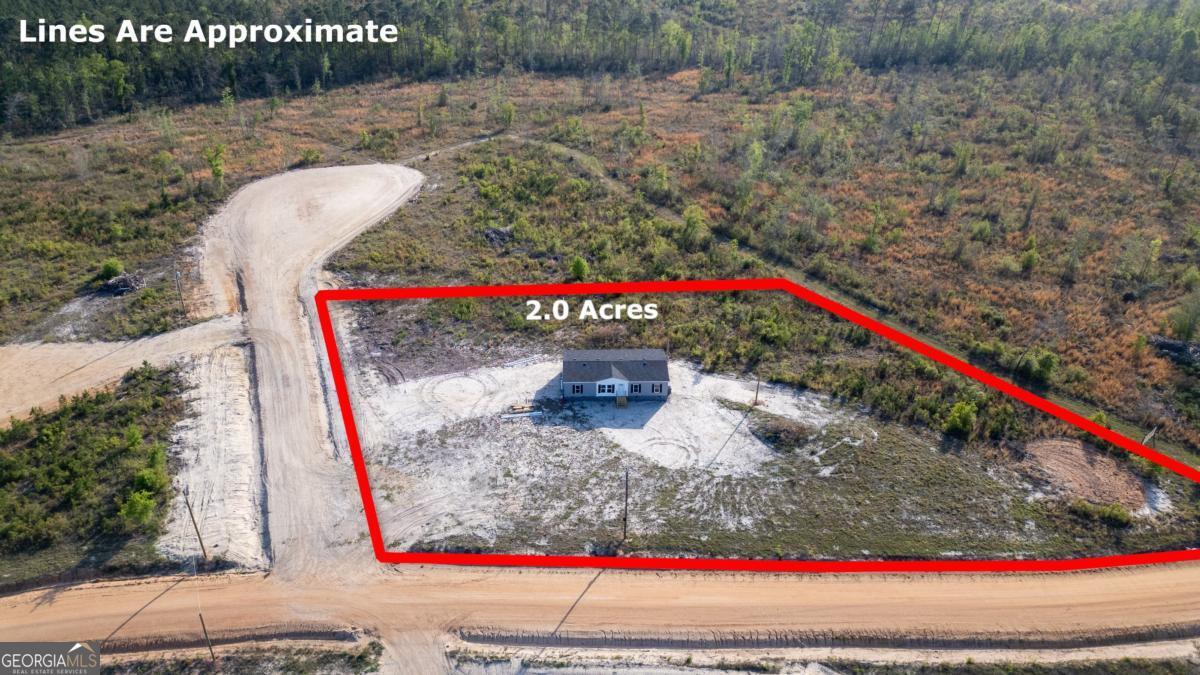 67 Long Leaf Road Hazlehurst, GA 31539 - Photo 3 of 17 a view of a wooden fence